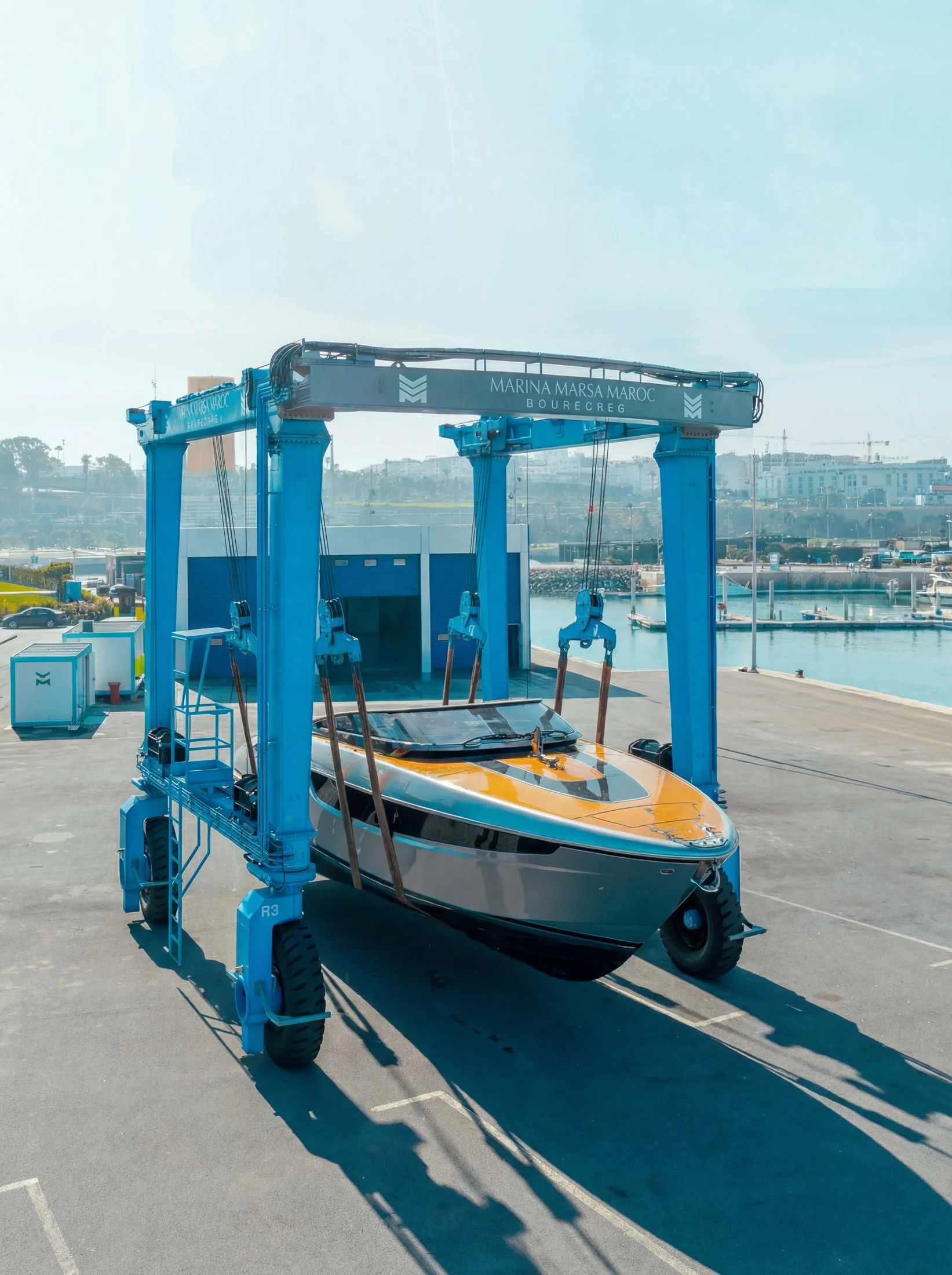 The Marina Marsa Maroc travel lift handling a yacht at Bouregreg