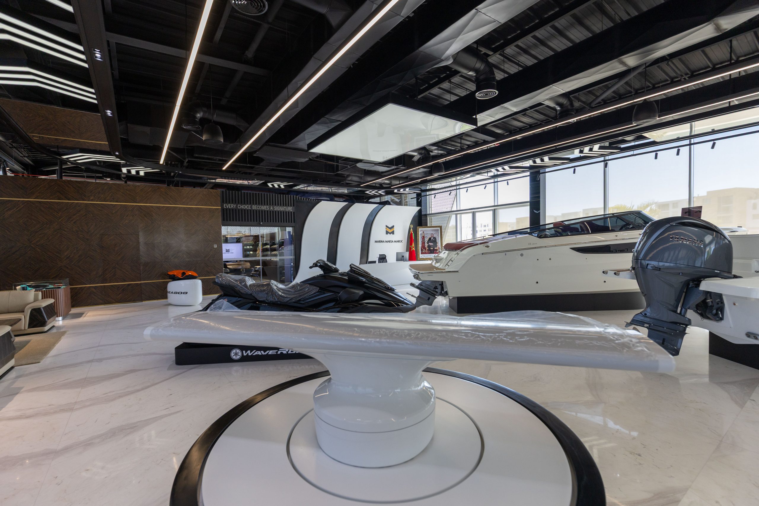 The showroom reception, yacht collection and Yamaha personal watercraft